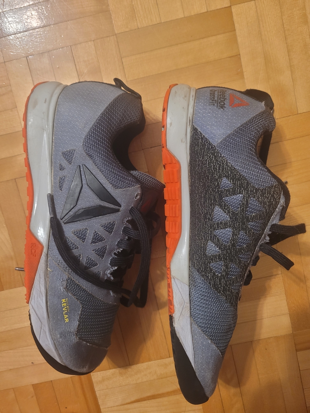 Reebok Men’s Gray and Orange Training Shoes